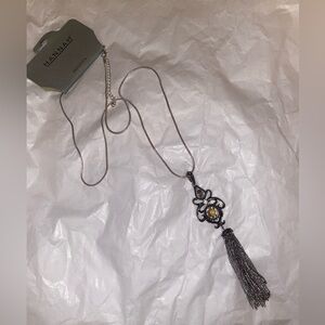 Silver 30” strand necklace with crystal pendant